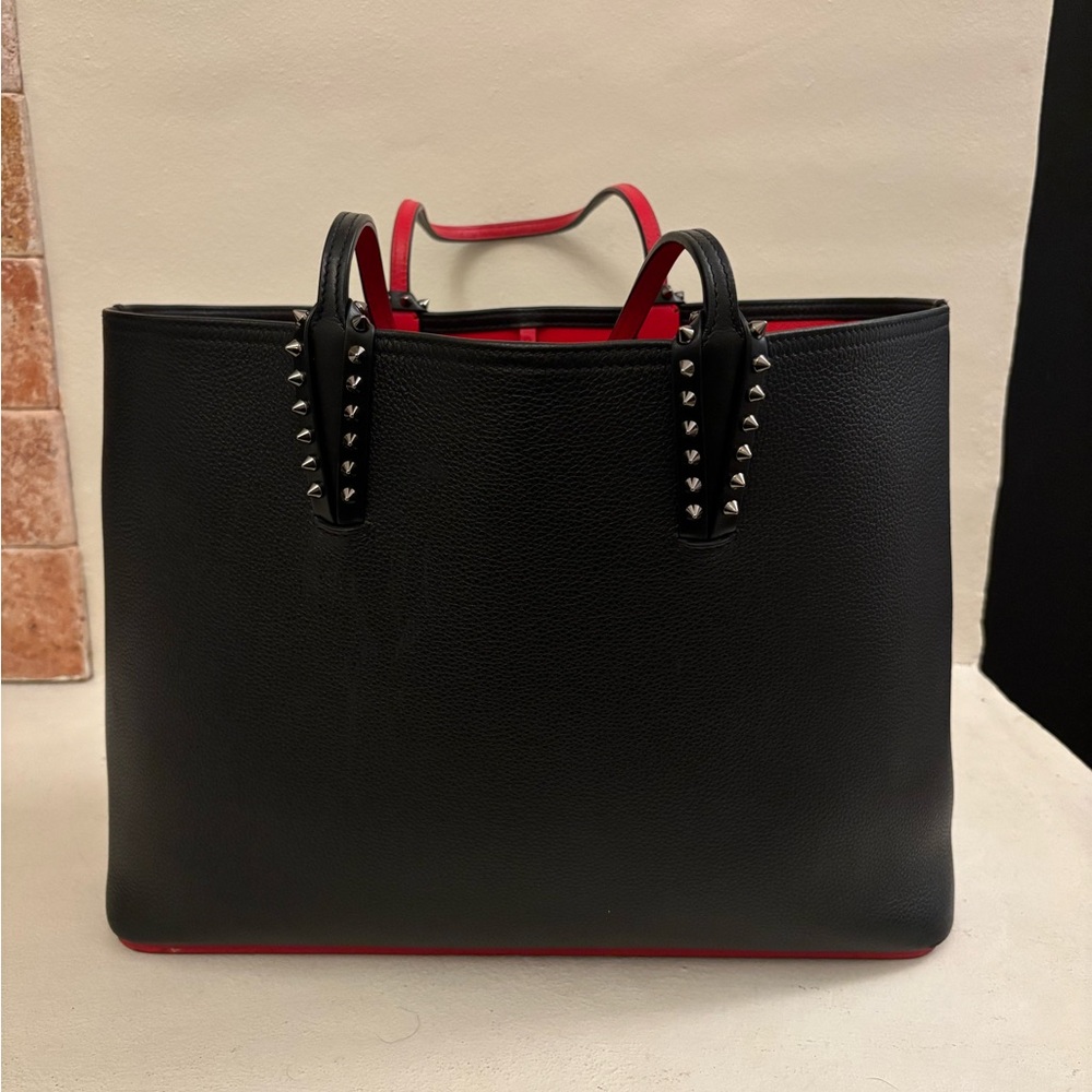 Luxury Christian Louboutin Black Tote Bag with Red Interior and Studded Handles